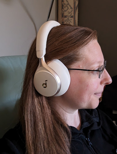 A photo of the writer's head while they are wearing the headphones